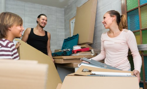 Moving team loading household items for a Brentford home move
