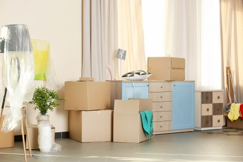 Furniture and boxes being loaded into a van for a Brentford move