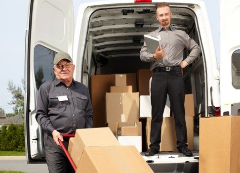 Packed boxes and labelled office items ready for transport