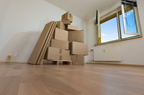 Loading boxes and household items into a removal van for a Brentford move