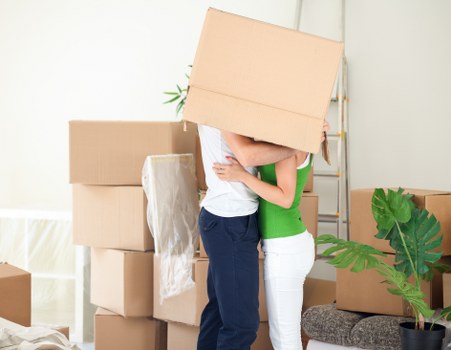 Packed boxes and furniture ready for removals van transport