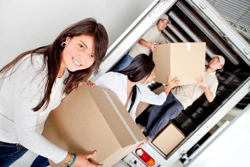 Furniture pick-up service in Brentford with bulky items being collected from a home